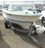 OLDER LARSON BOAT/ACCESSORIES W/SNOWCO TILT TRAILER