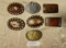 7 ASSORTED BELT BUCKLES - MOST LEATHER FACED BUCKLES