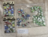 4 SMALL BAGS ASSORTED MARBLES