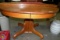 ANTIQUE OAK PEDESTAL DINING TABLE W/2 LEAVES - ON CASTERS - WILL NOT SHIP
