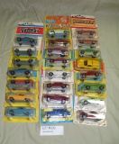 23 ASSORTED ERTL DIECAST METAL TOY VEHICLES W/PACKAGES