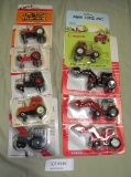 9 ASSORTED 1/64 SCALE TOY TRACTORS W/PACKAGES - 7 ARE ERTL DIECAST METAL