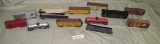 APPROX. 13 ASSORTED TOY TRAIN CARS - SOME PARTS