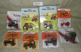 8 ASSORTED TOY TRACTORS W/PACKAGES - 4 ERTL DIECAST