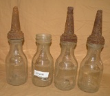 4 GLASS JARS WITH METAL SPOUTS