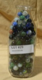 GLASS MILK BOTLE W/ASSORTED MARBLES