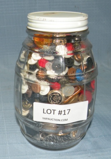 GLASS JAR FULL OF ASSORTED BUTTONS