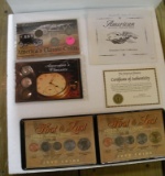 4 COMMEMORATIVE COIN SETS - 21 TOTAL COINS