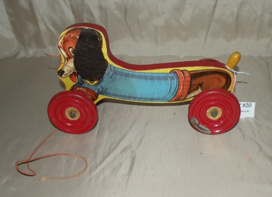 THE GONG BELL MFG. CO. MUSICAL DOG PULL TOY