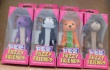 4 FUZZY FRIENDS PEZ DISPENSERS - N.O.S. IN BOX