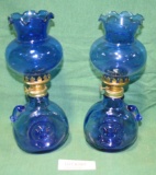 2 SMALL DECORATIVE BLUE GLASS OIL LAMPS W/CHIMNEYS