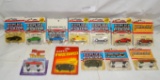 12 ASSORTED ERTL DIECAST TOY VEHICLES W/PACKAGE