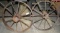 PAIR OF RUSTIC IRON IMPLEMENT WHEELS - LOCAL PICKUP ONLY