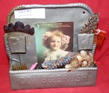 VINTAGE TIN COMB & BRUSH HOLDER W/CONTENTS