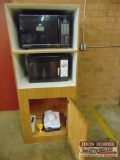 Cabinet with Two Microwave Ovens.