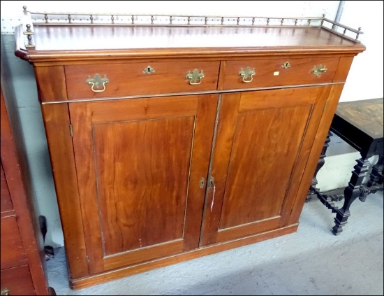 Chippendale mahogany cabinet with brass gallery