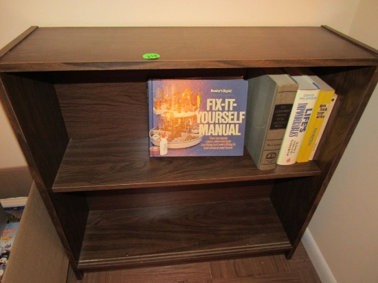 Wooden shelf and books