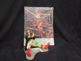 Firewoman advertisement and figurine