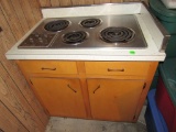 Stove top and cabinet