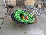 Wheelbarrow, garden hoses, and more