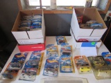 2 boxes of various hot wheels