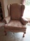 Upholstered chair and pillow