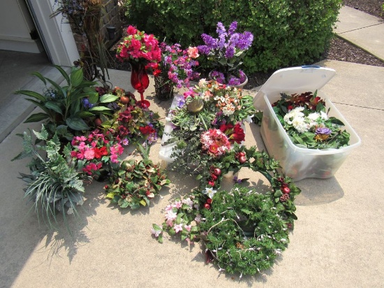 Large collection of artificial flowers and plants