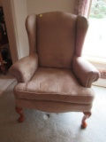 Upholstered chair and pillow