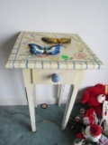 Wooden table and butterflies