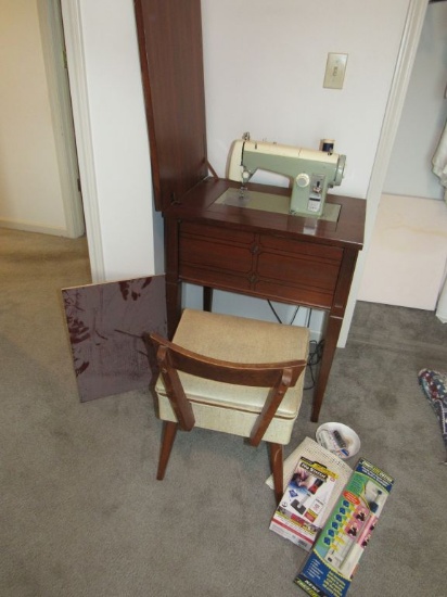 Sewing machine and cabinet