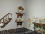 Large grouping of angels, dolls and shelves