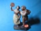 Hand carved dancing couple