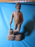 Hand carved man with axe