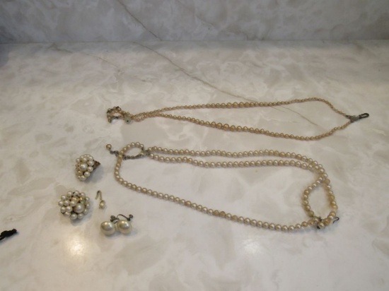 Pearl colored necklaces with earrings