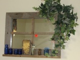 Decorative mirrored frame and contents