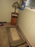 Rugs and stand and lamp