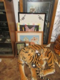 Stuffed tiger and framed art