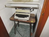 Electric typewriter with stand