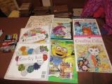 Assorted coloring books and markers