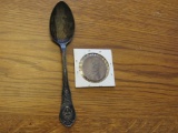 Spoon and coin