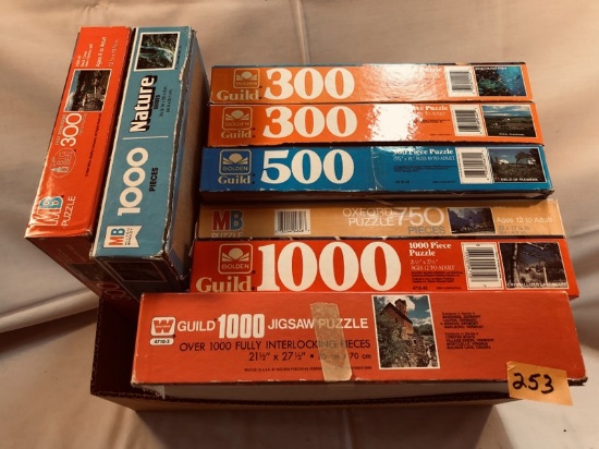 8 Boxes of puzzles