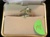 Ladies Ring size 5 1/2 Marked 10K w/Emeralds