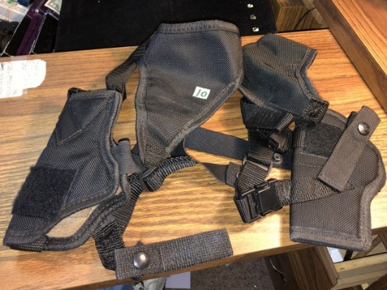 Shoulder harness for a pistol on each side