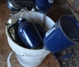PAIL OF EAGLE BRAND OIL PUMP CANS