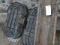 (2) 50 GALLON RUBBERMAID TUBS W/ METAL HOG TROUGH