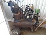 SURGE VACUUM PUMP, 115V, IN WORKING CONDITION