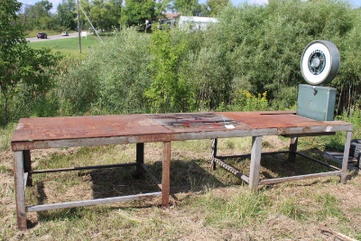 10ft. metal table with built in Toledo platform scale, used for weighing screws