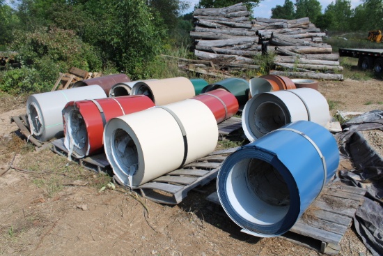 13 coil stock metal rolls – outside, w/ damage