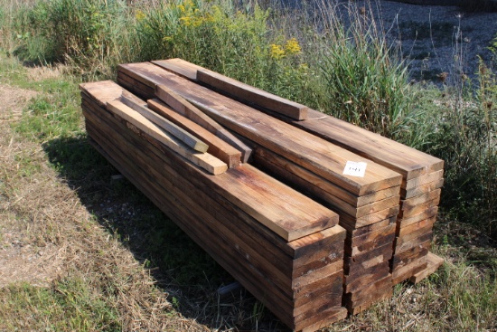 (65) 2"x10"x8' water damaged dimensional lumber, stored outdoors