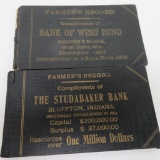 Two banking farm book keeping books, Bank of West Bend, Studabaker Bank